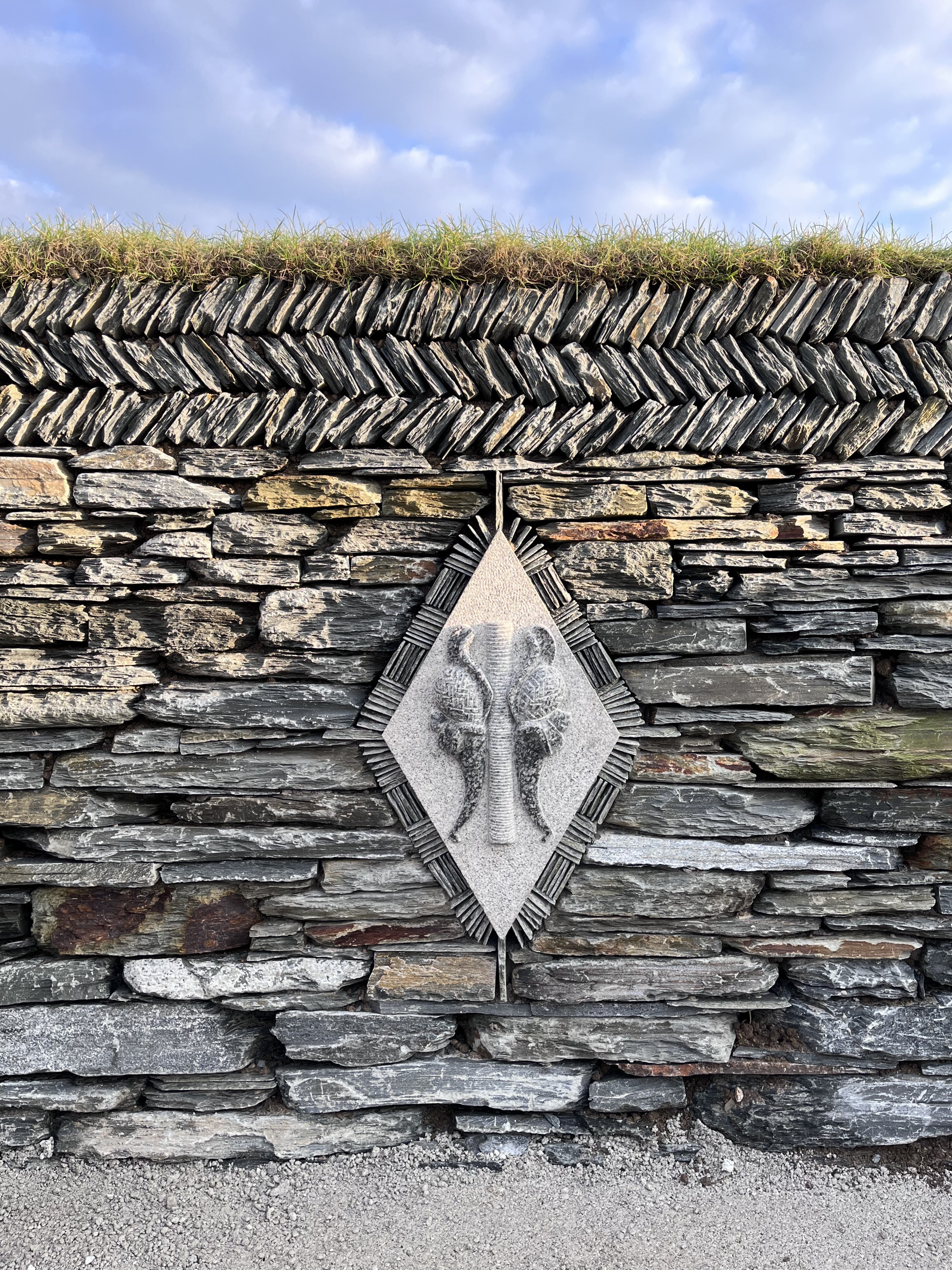 Photo of a grating reflected in a pool