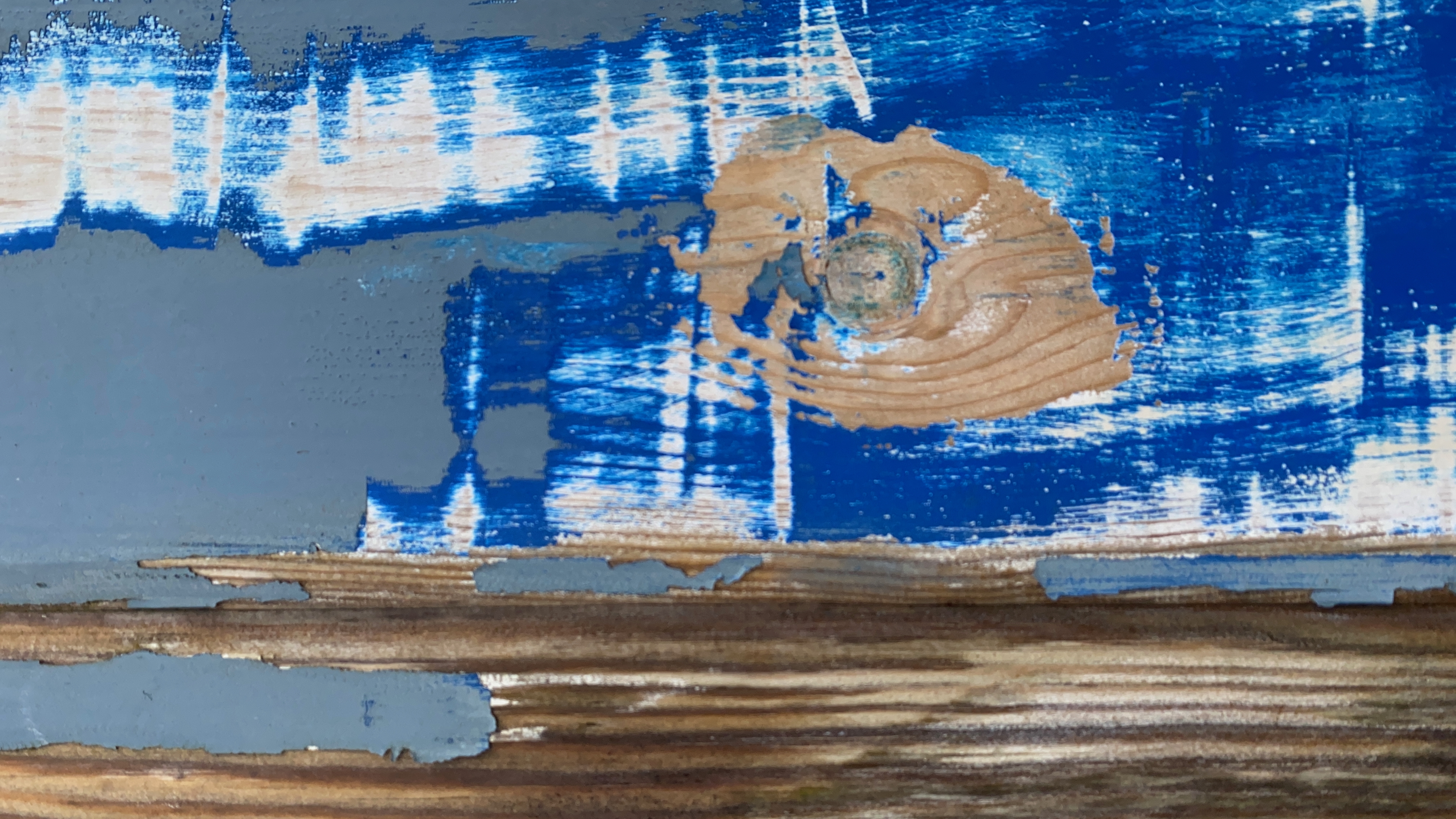 Photo of layers of paint on a shed door